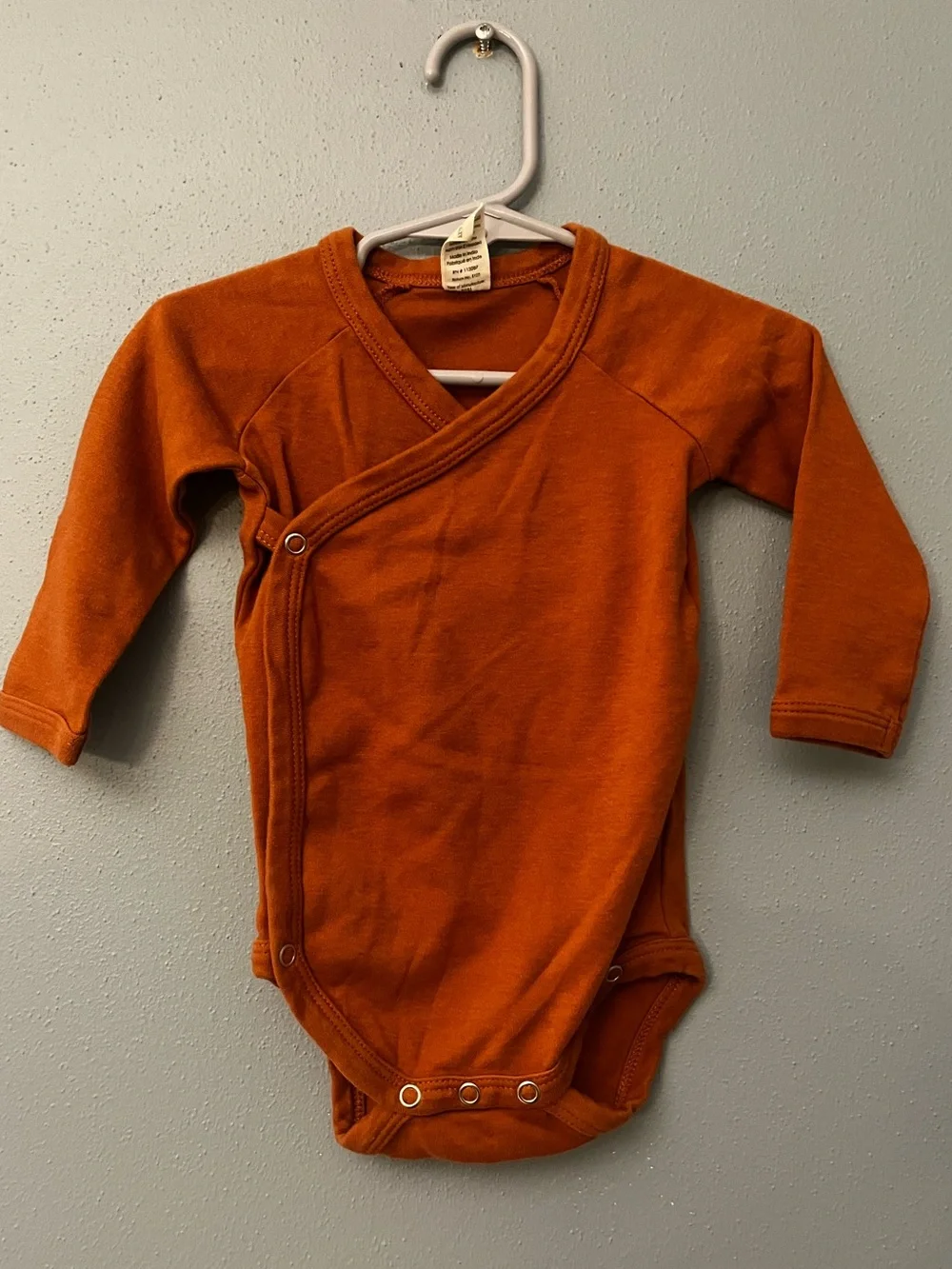 Kate Quinn Wrap-Front Long-Sleeve Onesie